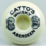 ABERDEEN CATTOS WHISKY MATCH STRIKER. 4.25ins diam, donut shape striker/ holder, off white glaze