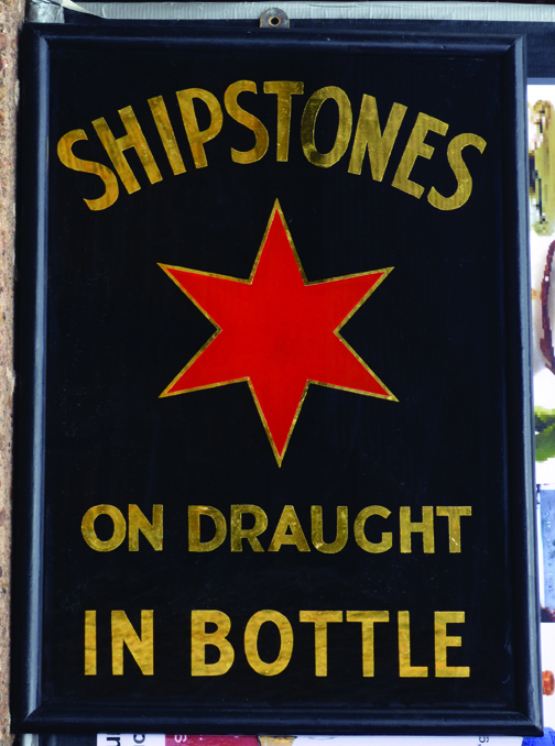 SHIPSTONES GLASS SIGN. 24 x 17.25ins, printed glass advert for SHIPSTONES/ ON DRAUGHT/ IN BOTTLE,