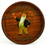 EDINBURGH WM YOUNGER & CO BREWERY TRAY. 12ins diam, early wood effect, black backed tray. Central