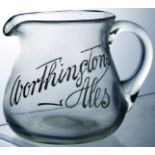 WORTHINGTONS ALES. 4ins tall, clear glass, handled, squat jug for WORTHINGTONS/ ALES white enamelled
