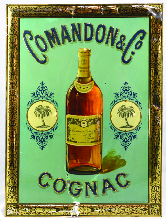 COMANDON & CO TIN SIGN. 19.75 x 14.25ins, pressed tin sign for COMANDON & CO/ COGNAC, pictorial