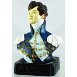 KING GEORGE WHISKY ADVERTISING BUST. 9ins tall, coloured rubberoid bust figure for King George IV/