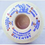 COVENTRY MATCHSTRIKER. 4.25ins diam, donut shaped striker & holder for COOKS TOBACCO, CIGAR/ AND