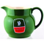 ANSELL BEER JUG. 4.25ins tall, green, handled beer jug for ANSELLS/ The Better Beer, either side &