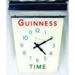 GUINNESS HANGING CLOCK. 17 x 13.5ins, perspex clock (no chain), for GUINNESS/ TIME in red & green