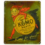 KOMO PASTE TIN ADVERT. 7 x 6ins, multicoloured sign with Imp like figure running tin of KOMO PASTE
