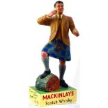 MACKINLAYS BACK BAR STATUETTE. 14ins tall, realistically modelled kilted Scotsman, toasting a wee