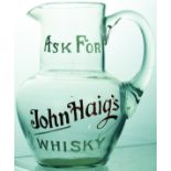 HAIGS WHISKY WATER JUG. 5.75ins tall, clear glass, handled jug for ASK FOR/ JOHN HAIGS/ WHISKY in