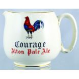 COURAGES ALE JUG. 4.25ins tall, off white glaze, gold highlights. Courage/ Alton Pale Ale one