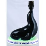 GUINNESS SEAL LAMP BASE. 9ins tall to top of bulb fitting. Classic Guinness seal figure, GUINNESS IS