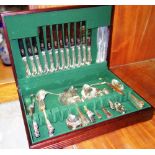 A 20th century silver plated canteen of cutlery in a mahogany box.