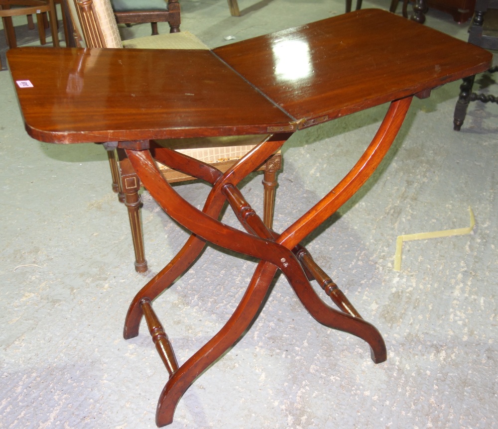 A small 19th century mahogany coaching table.