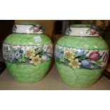 A pair of Maling lustre ginger jars and carvers.