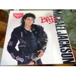 Michael Jackson; 'Bad'. A signed record with unauthenticated signature.