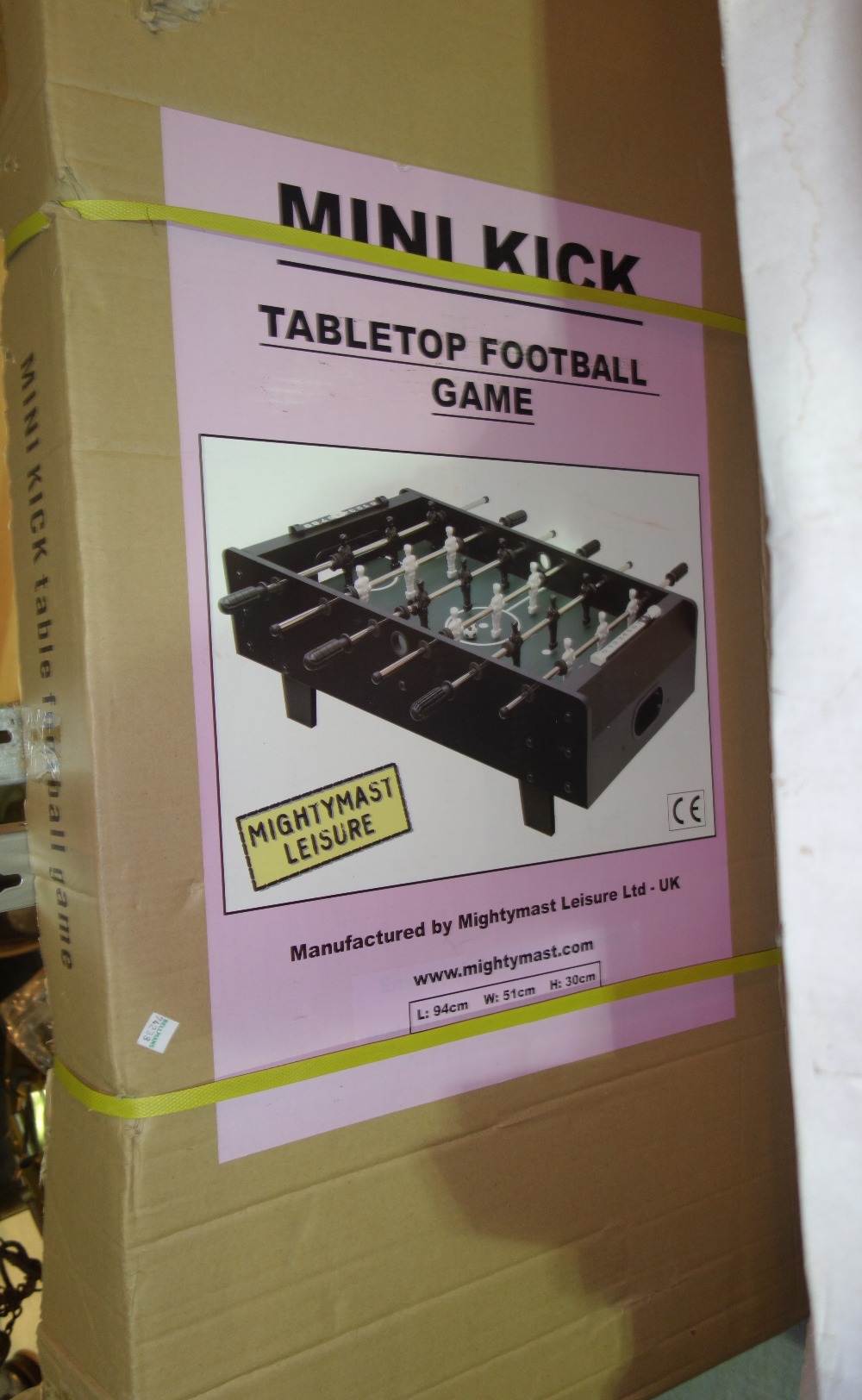 A child's snooker table (boxed), a table football game (boxed) and one other game, (3).