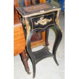 A late 19th century French ebonised inlaid and gilt metal mounted small side table, 34cm wide.
