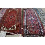 A Hamadan rug, 204cm x 104cm, and a Maslaghan rug, 192cm x 78cm (2).