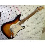 A 20th century Fender Squier Stratocaster with sunburst body.