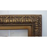 A 20th century gilt plaster frame, of foliate decoration, aperture 144cm x 96.5cm.