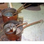 A group of seven early 20th century copper pans, (7).