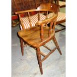 An elm seated low back scullery chair.