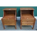 A pair of 20th century cherry wood two drawer bedside tables, 47cm wide x 63cm high.