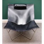 20th century design; a black leather chair on a tubular metal base, 90cm wide x 80cm high.