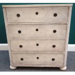 A 19th century Dutch white painted chest of four long drawers on bun feet, 82cm wide x 90cm high.