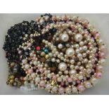 A collection of jewellery, comprising; eight brooches, a silver and colourless gem set bracelet,