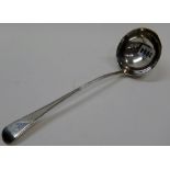 A George III silver bead edged Old English pattern soup ladle, crest engraved, London 1806,