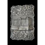 A Victorian silver 'castle top' card case of shaped rectangular form,