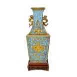 An unusual Chinese porcelain two-handled vase made to simulate enamel,