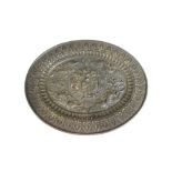 A white metal applied copper oval plaque, Indian or Burmese, 19th century,