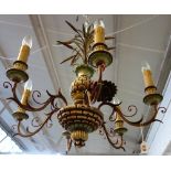 A modern polychrome painted six branch chandelier, the carved wooden body of 'pineapple' form,