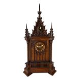 A Black Forest walnut cuckoo clock retailed by Camerer, Kuss & Co , late 19th century,