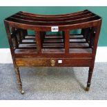 A Regency mahogany four division Canterbury, with single drawer, on turned supports,