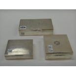 A group of three silver mounted cigarette boxes, each wooden lined within,