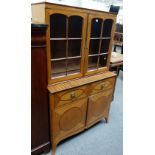 A George IV and later satinwood secretaire bookcase cupboard, with fitted drawer,