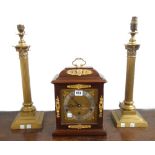 A modern Elliott mahogany cased eight day Westminster chime clock (28cm high) and a pair of modern