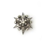 A Victorian diamond brooch, designed as a six pointed star burst,