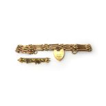 A gold bar and decorated oval link gate bracelet, on a 9ct gold heart shaped padlock clasp,