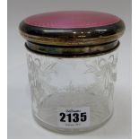 A silver and translucent pink enamel topped dressing table jar,