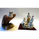 A Royal Crown Derby porcelain bald eagle on a naturalistic rocky base, 23cm high,