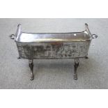 A steel plate warmer, 19th century, of shaped rectangular form,