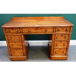 A Victorian satin birch nine drawer pedestal desk, 122cm wide x 55cm deep.