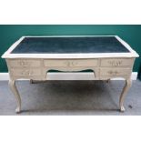 A 20th century grey painted bureau plat of Louis XV design,