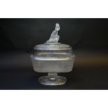 A Gillander & Sons Westward Ho oval glass compote, with kneeling Indian finial to the lid,