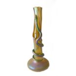 A Loetz iridescent glass vase, early 20th century of stylized tree trunk form with three openings,