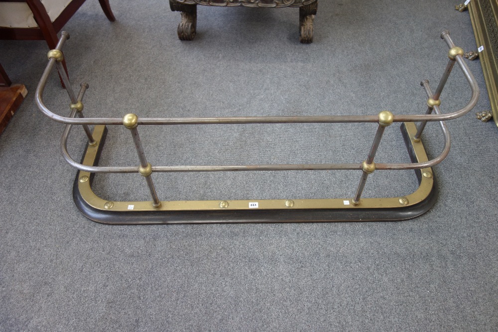 A 19th century brass and steel fender,