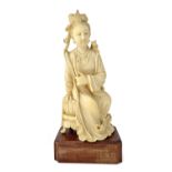 An Chinese ivory figure of a woman, early 20th century,